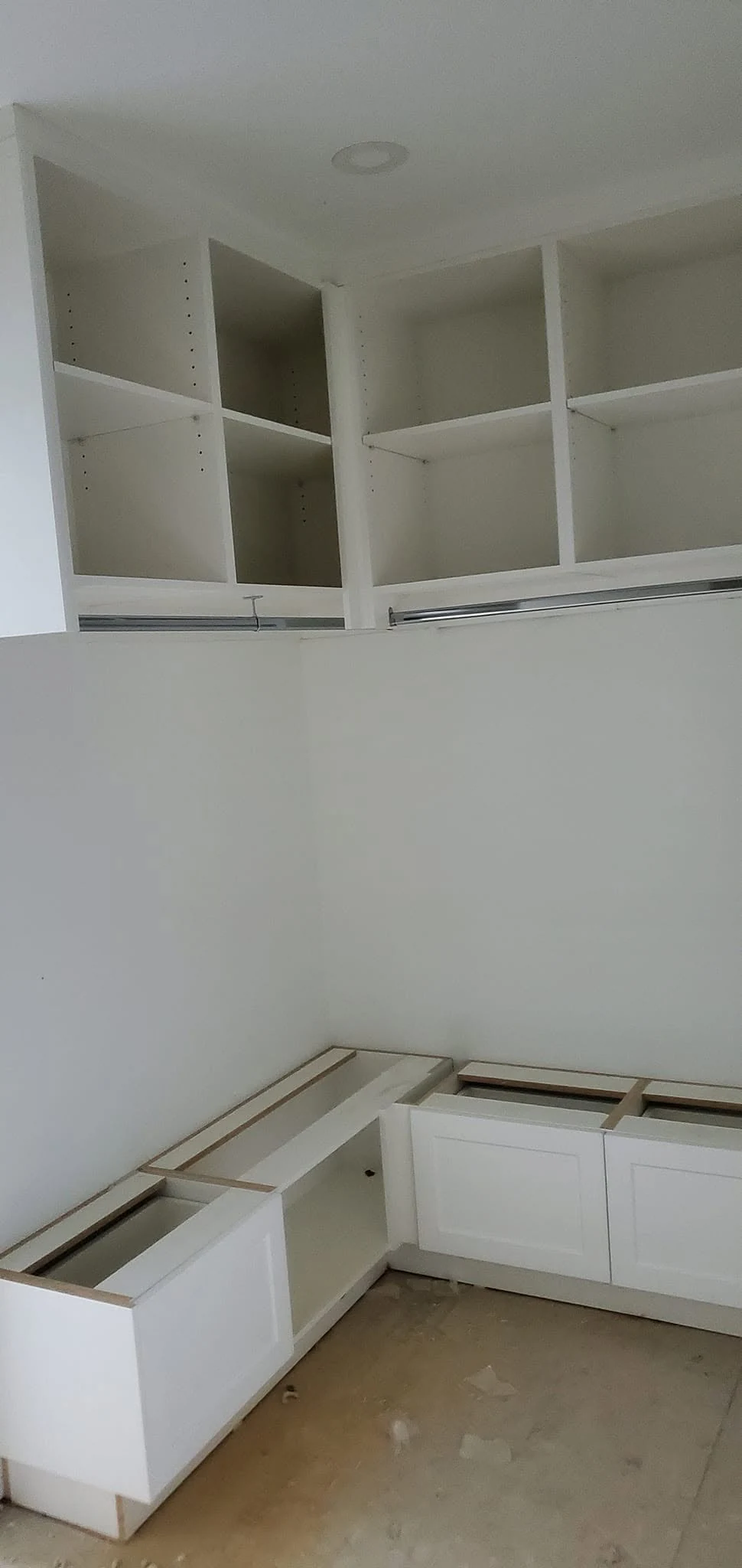 Upper shelving and hanging sections in the Goldstream Heights closet