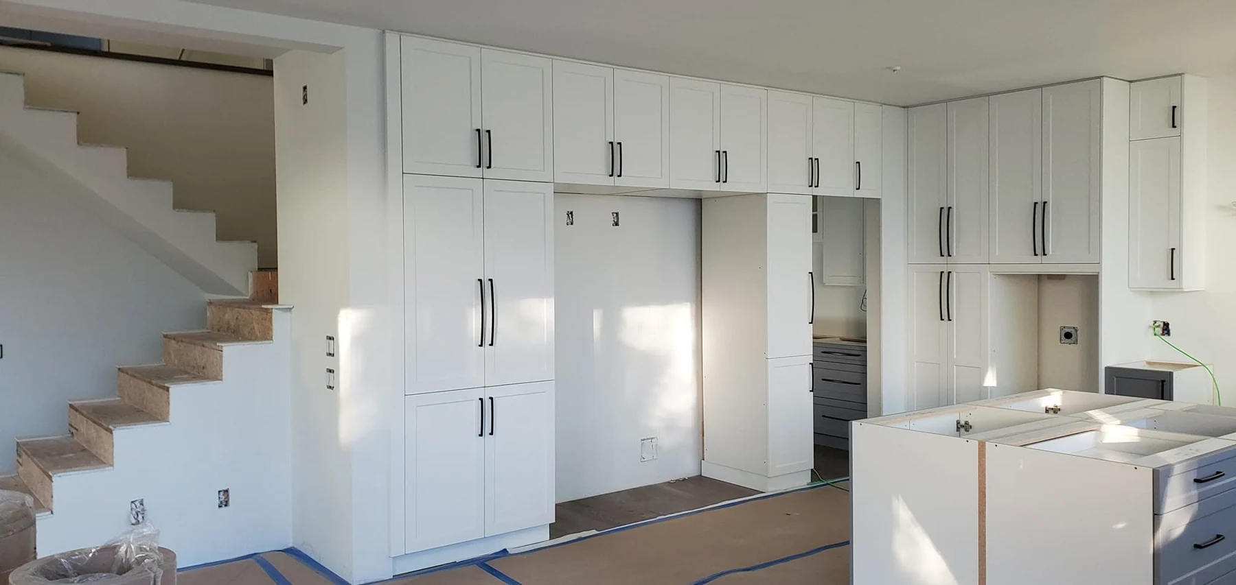 Kitchen installation in progress in a new build